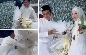 video-aksi-pengantin-lelaki-hampir-terjat0h-angkat-bunga-hantaran-rm20k-tarik-perhatian-warganet_619cb22cc291b-2048x1312